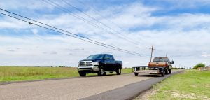Woodrow Road is so narrow, even with newly patched shoulders vehicles barely have enough room to pass; it is a condition that has existed for more than a decade.